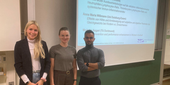 Die Doktorandinnen Frederike Adammek, Anna Maria Wissmann und der Doktorand Mojtaba Asgari.